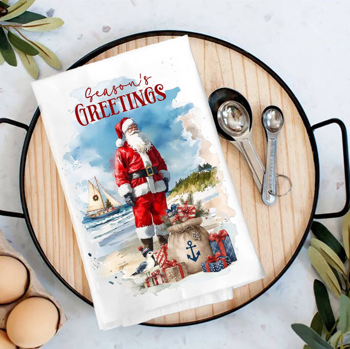 Coastal Christmas Santa on beach Tea Towel